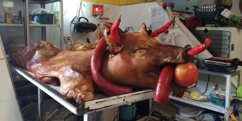 Ecuadorian pig at local butchery — © Laura Straub.