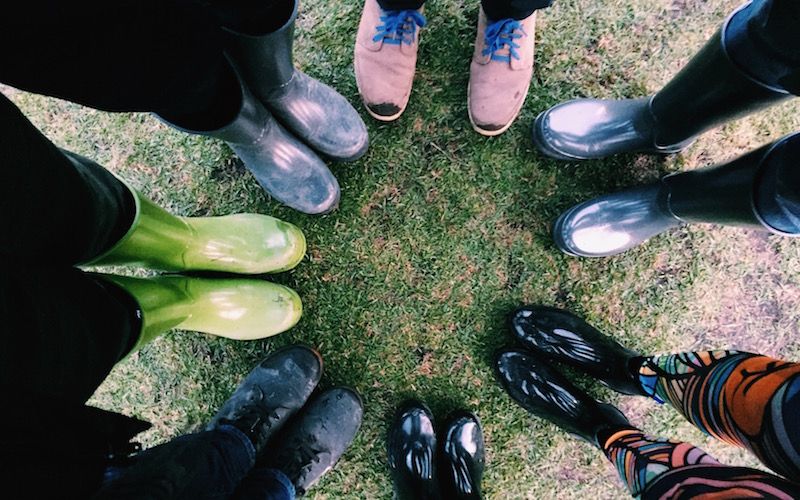 Circle of waterproof shoes at Estéreo Picnic — © Nick Anderson.