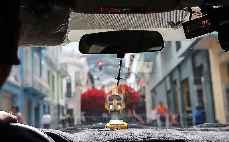 Getting a taxi in Quito — © moxyphotography / iStock.